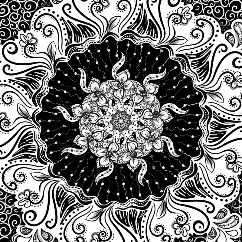 A black and white mandala of petals, swirls and dots drawn by hand.