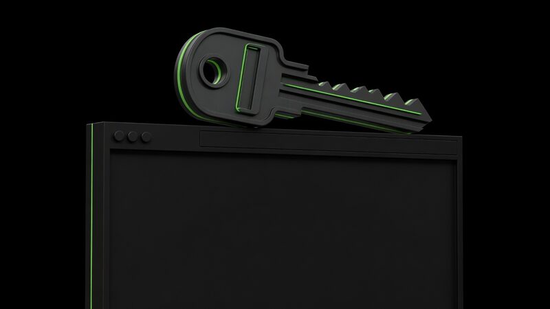 A solid key resting across a blank green-edged website window frame, website ownership, domain and admin login, Kief Studio, Shrewsbury Massachusetts.